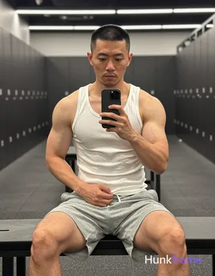 Photograph of exactly 1 adult man. Man 1: East Asian, light-medium, square-jawed