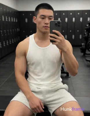 Photograph of exactly 1 adult man. Man 1: East Asian, light-medium, square-jawed
