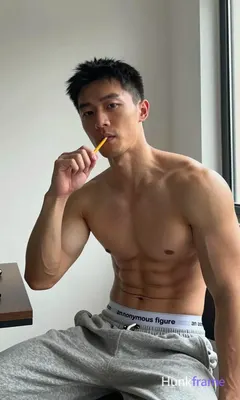 Asian man with light-medium skin and short dark black hair, clean-shaven smooth 