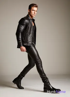 A young adult male with a well-defined athletic build poses confidently in an up