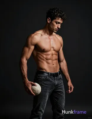 Striking full-bleed vertical wallpaper composition of shirtless adult man with broad shoulders and s