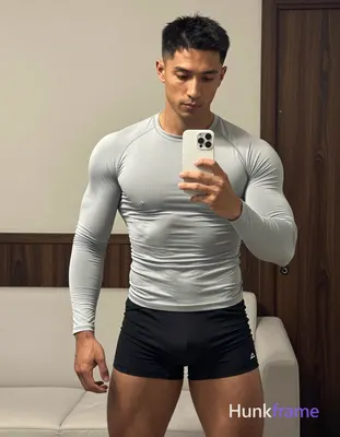 an anonymous figure adult man with light to medium tan skin and short black stra