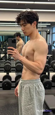 Photograph of exactly 1 adult man. Man 1: Asian, light to medium tan, oval with defined jawline, sho