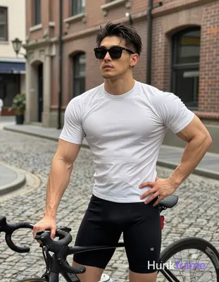 Asian man with light-medium skin and short dark hair featuring a textured top and faded sides, weari