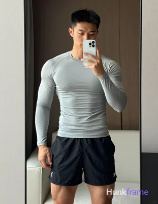 an anonymous figure man with light to medium tan skin and short black straight h