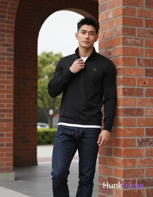 Asian man, light-medium skin, short textured black hair styled upward at the crown with tapered side