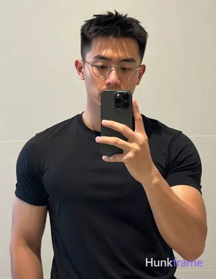 an anonymous figure man with light to medium tan skin sheen standing in front of