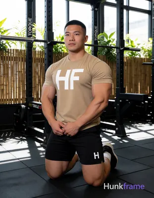 Heavily muscular adult man with substantial muscle mass, wide shoulders, thick n