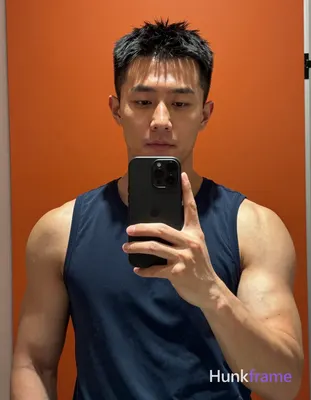 Photograph of exactly 1 adult man. Man 1: Asian, light to medium tan, oval with 