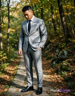 Photograph of exactly 1 adult man. Man 1: Asian, medium-light, oval with strong