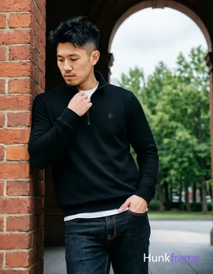 Asian man, light-medium skin, short textured black hair styled upward at the crown with tapered side