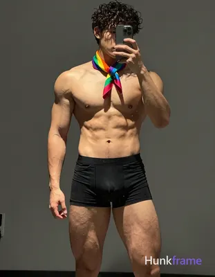 an anonymous figure man with warm olive skin, curly dark hair, and a compact ath