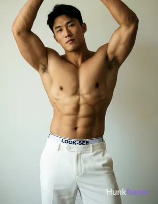 A photorealistic portrait of a shirtless Asian man standing with his arms raised