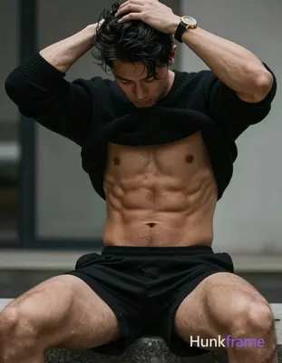 Photoreal photograph of a man with a compact athletic build and defined abs, sta