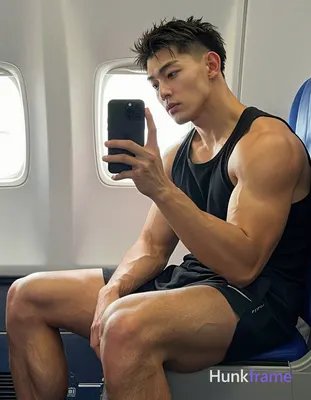 Asian man with light to medium tan skin and short dark brown hair featuring a textured top fade, cle