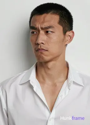 an anonymous figure man with light to medium tan skin texture and pores, short b