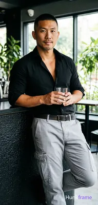 Asian man with medium-tan skin and short black buzz cut, clean-shaven chin with light upper lip stub