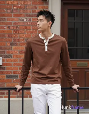 an anonymous figure man with light to medium tan skin and short spiky black hair, clean-shaven face;