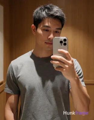 an anonymous figure man with light-medium warm skin and short textured dark hair