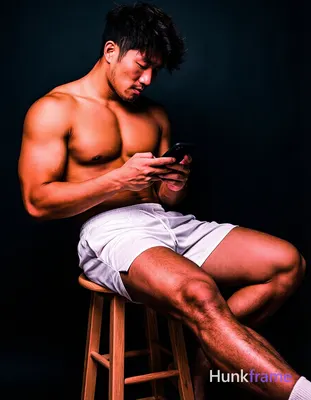Bold flat-color wall art graphic design of shirtless Asian man with tanned skin seated sideways on w