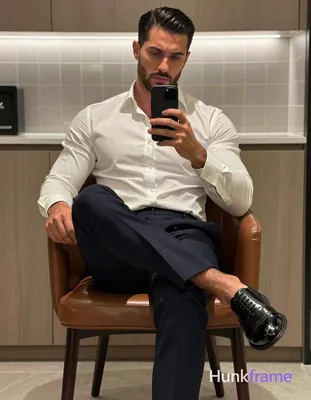 Photograph of exactly 1 adult man. Man 1: light to medium, oval with defined jawline, short, dark br