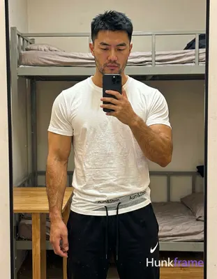an anonymous figure man with light to medium tan skin, short textured black hair