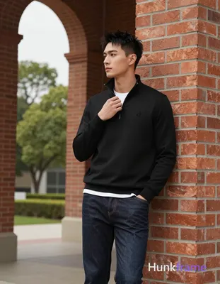 Asian man, light-medium skin, short textured black hair styled upward at the crown with tapered side