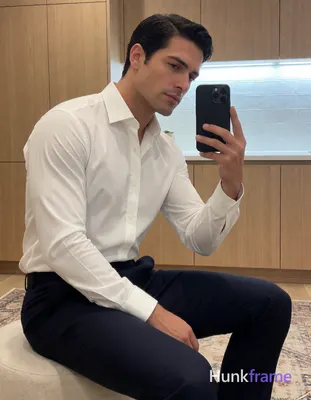 Photograph of exactly 1 adult man. Man 1: light to medium, oval with defined jawline, short, dark br