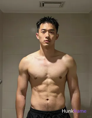 Asian man with light medium tan skin wet sheen, black short slicked back hair receding at temples, c