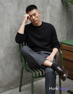 Photograph of exactly 1 adult man. Man 1: Asian, light-medium, oval with defined