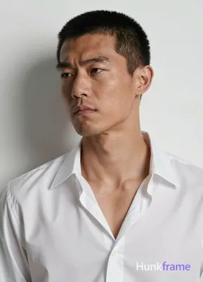 an anonymous figure man with light to medium tan skin texture and pores, short b