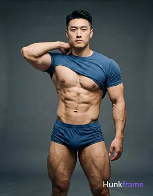 A photorealistic portrait of a handsome masculine male standing with one arm bent over his shoulder,