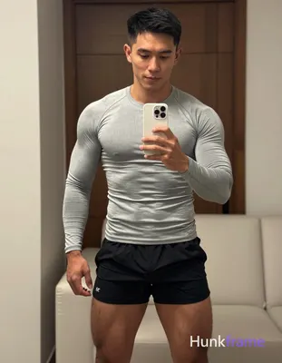 an anonymous figure adult man with light to medium tan skin and short black stra