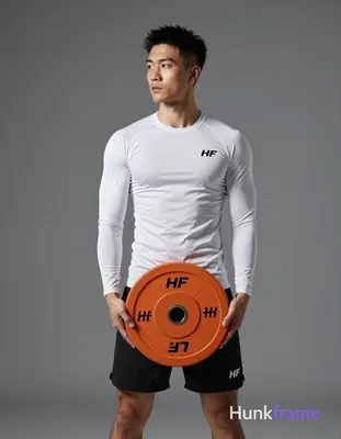 Asian adult man with short black textured hair and clean-shaven face, neutral serious gaze leftward 
