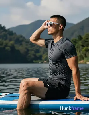 Asian man with light-medium skin and short buzz cut, wearing white-framed rectangular sunglasses pus