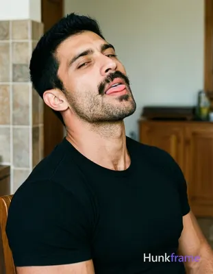 an anonymous figure man with short black hair and upward texture, sparse mustache and chin stubble,