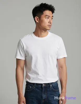 Asian man with light-medium skin and short dark black hair featuring a textured 