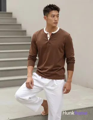 an anonymous figure man with light to medium tan skin, short textured dark brown hair styled upward